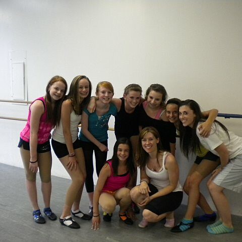 A group of teenage girls at a dance studio with their teacher Jeanette Mangulis